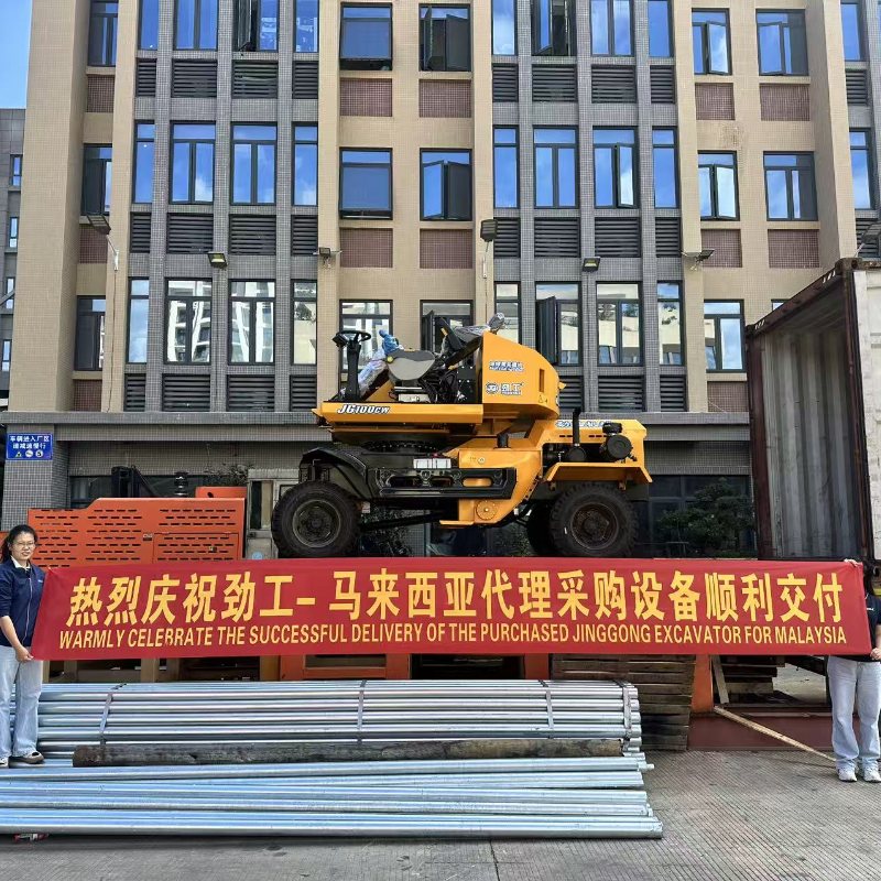 จิงกงและตัวแทนมาเลเซียส่งมอบรถตัก 100CW สำเร็จ